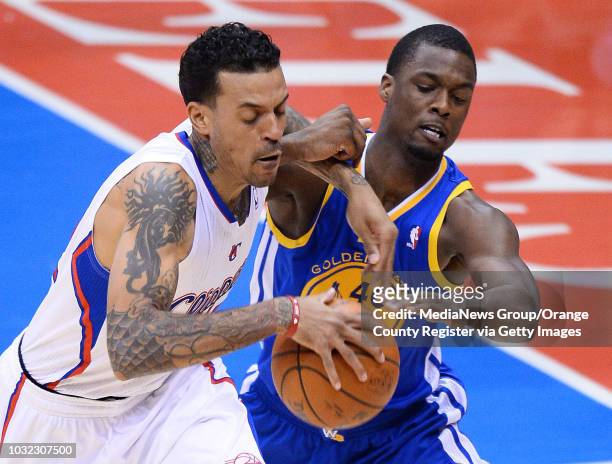 The Clippers' Matt Barnes battles for a loose ball with the Warriors' Harrison Barnes during the Clippers' 113-103 victory in Game 5 of their first...