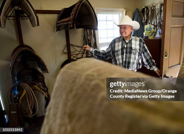 Legendary rodeo producer Cotton Rosser stands in the Tack Room of the ...