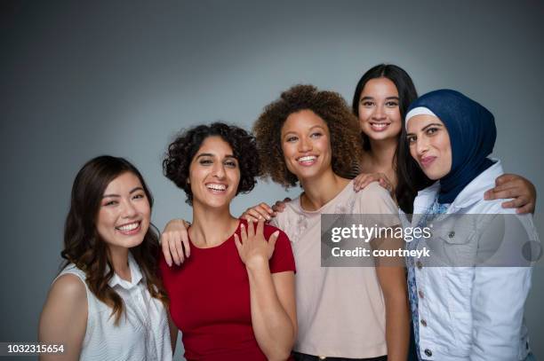 portrait of a group of women in the studio. - feminism stock pictures, royalty-free photos & images