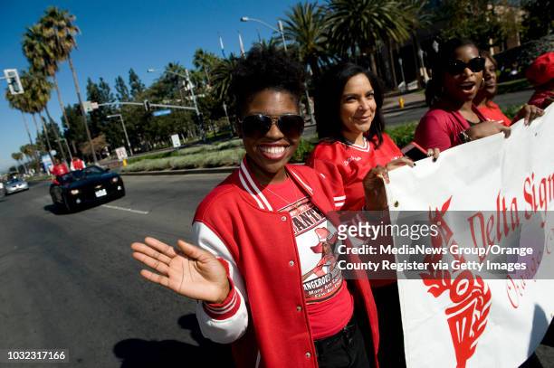 Aisha Brento of Anaheim, marches with other members of the Delta Sigma Theta Sorority in the 34th annual Orange County Black History Parade along...