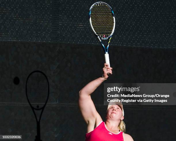 Louise Hunt, of Germany, hits the ball during her doubles semi-finals match with partner Katharina Kruger during the UNIQLO Wheelchair Tennis Doubles...