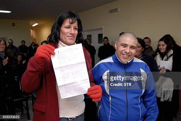 Transvestite and ex inmate Diana Acuna Talquenca and prison inmate Osvaldo Martin Torres, after their marriage at Almafuerte prison, in Lujan de...