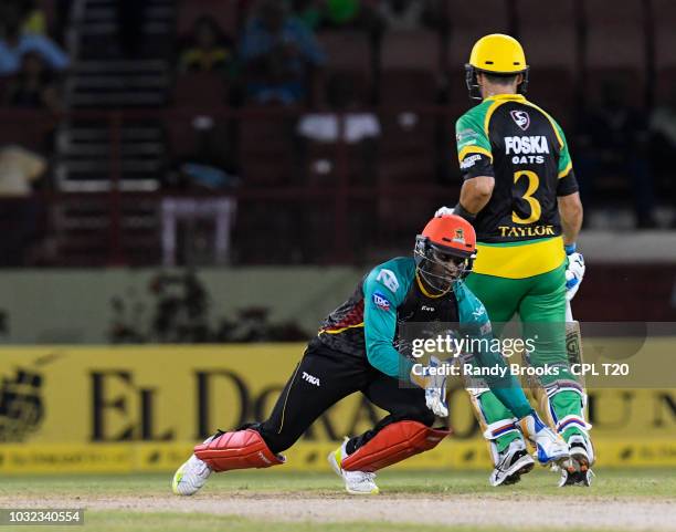 In this handout image provided by CPL T20, Devon Thomas of St Kitts & Nevis Patriots fielding during the Hero Caribbean Premier League Play-Off match...