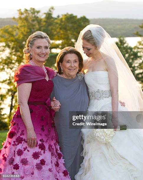 In this handout image provided by Barbara Kinney, U.S. Secretary of State Hillary Clinton, her mother Dorothy Rodham and Chelsea Clinton pose during...