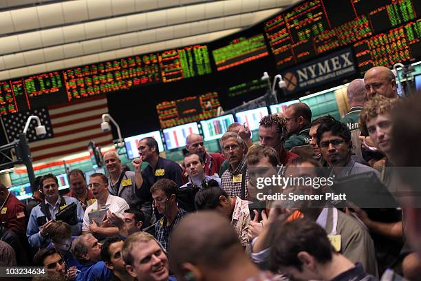 Traders in crude oil and natural gas options work on the floor of the New York Mercantile Exchange on August 4, 2010 in New York City. Following the...