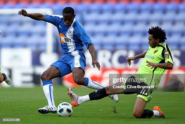 Maynor Figueroa of Wigan Athletic in action with Jermaine Pennant of Real Zaragoza during the pre season friendly match between Wigan Athletic and...