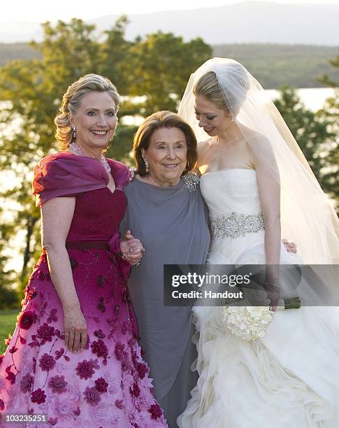 In this handout image provided by Barbara Kinney, U.S. Secretary of State Hillary Clinton, her mother Dorothy Rodham and Chelsea Clinton pose during...