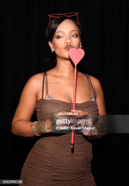 Rihanna poses backstage for the Savage X Fenty Fall/Winter 2018 fashion show during NYFW at the Brooklyn Navy Yard on September 12, 2018 in Brooklyn,...