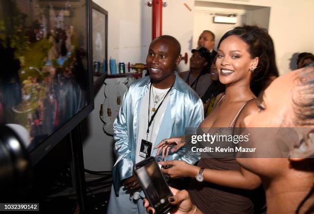 Rihanna poses backstage for the Savage X Fenty Fall/Winter 2018 fashion show during NYFW at the Brooklyn Navy Yard on September 12, 2018 in Brooklyn,...