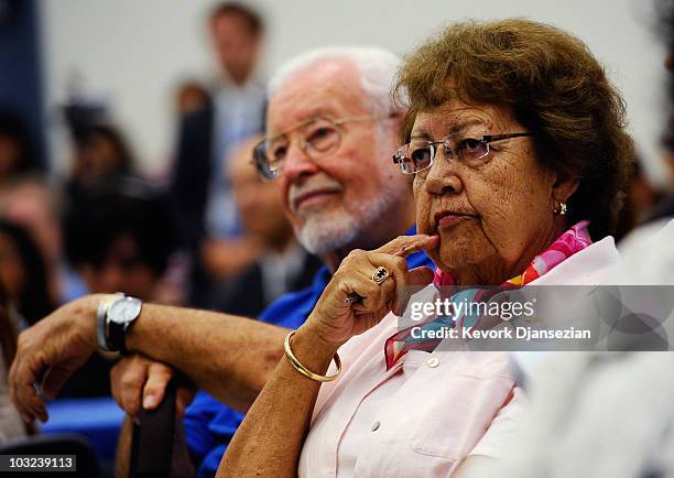 Pat Ryan, a retired school teacher from Long Beach, California, listens to U.S. Speaker of the House Rep. Nancy Pelosi speak at an event to mark the...