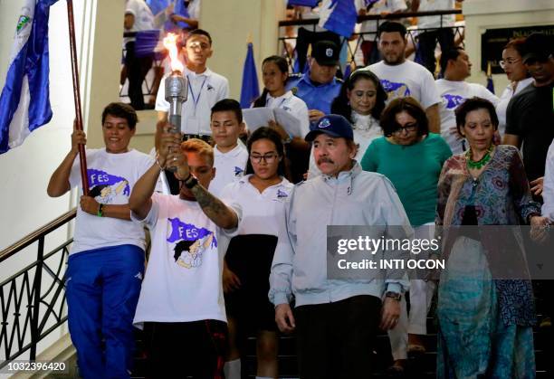 Nicaraguan President Daniel Ortega takes part in a ceremony to receive the torch of Peace and Freedom of Central America for the 197th anniversary of...