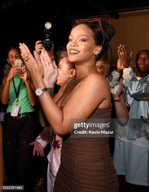 Rihanna poses backstage for the Savage X Fenty Fall/Winter 2018 fashion show during NYFW at the Brooklyn Navy Yard on September 12, 2018 in Brooklyn,...