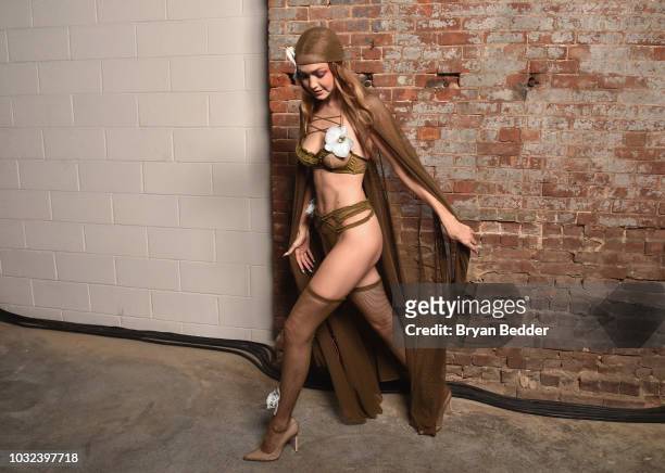 Model Gigi Hadid poses backstage for the Savage X Fenty Fall/Winter 2018 fashion show during NYFW at the Brooklyn Navy Yard on September 12, 2018 in...