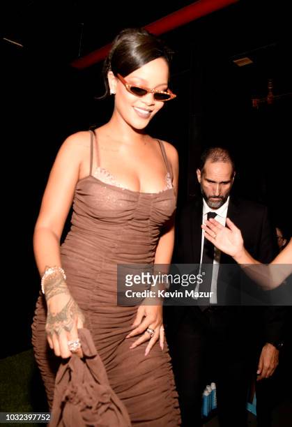 Rihanna poses backstage for the Savage X Fenty Fall/Winter 2018 fashion show during NYFW at the Brooklyn Navy Yard on September 12, 2018 in Brooklyn,...