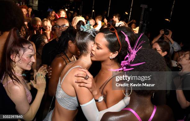 Bella Hadid and Rihanna pose backstage for the Savage X Fenty Fall/Winter 2018 fashion show during NYFW at the Brooklyn Navy Yard on September 12,...