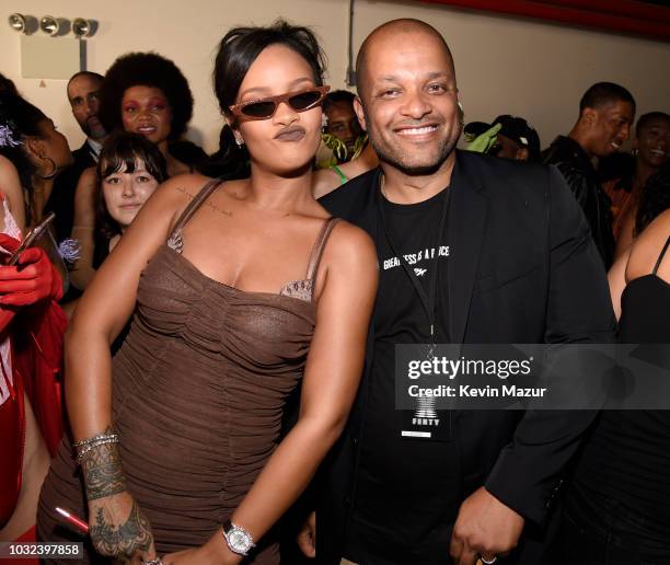 Rihanna and Jay Brown pose backstage for the Savage X Fenty Fall/Winter 2018 fashion show during NYFW at the Brooklyn Navy Yard on September 12, 2018...