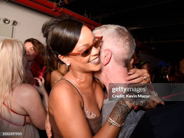 Rihanna and Mel Ottenberg pose backstage for the Savage X Fenty Fall/Winter 2018 fashion show during NYFW at the Brooklyn Navy Yard on September 12,...