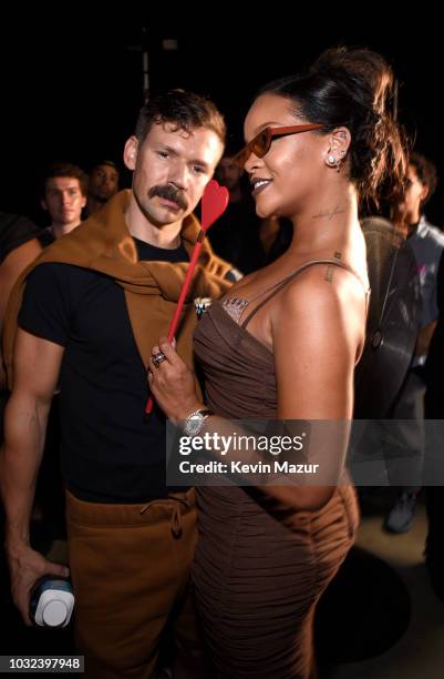 Adam Selman and Rihanna pose backstage for the Savage X Fenty Fall/Winter 2018 fashion show during NYFW at the Brooklyn Navy Yard on September 12,...