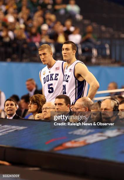 Mason Plumlee of Duke Miles Plumlee of Duke watch the action from the benchduring an NCAA Final Four semifinal game against West Virginia at Lucas...