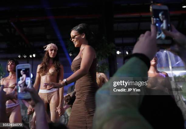 Rihanna walks the runway for the Savage X Fenty Fall/Winter 2018 fashion show during NYFW at the Brooklyn Navy Yard on September 12, 2018 in...