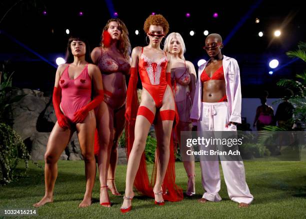 Models walk the runway for the Savage X Fenty Fall/Winter 2018 fashion show during NYFW at the Brooklyn Navy Yard on September 12, 2018 in Brooklyn,...