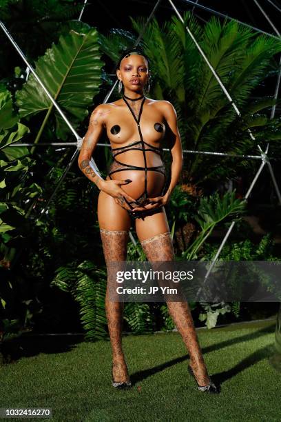 Model Slick Woods walks the runway for the Savage X Fenty Fall/Winter 2018 fashion show during NYFW at the Brooklyn Navy Yard on September 12, 2018...