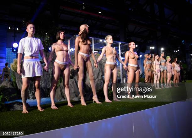 Models walk the runway for the Savage X Fenty Fall/Winter 2018 fashion show during NYFW at the Brooklyn Navy Yard on September 12, 2018 in Brooklyn,...