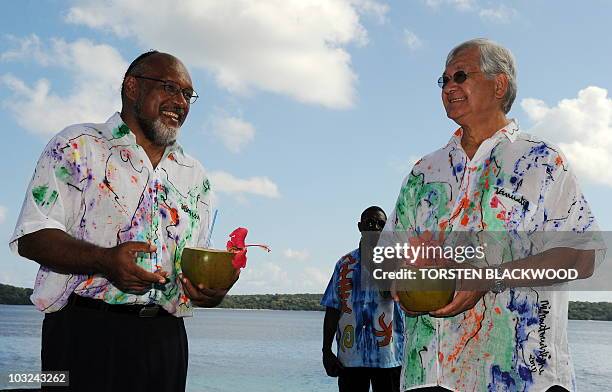 Vanuatu Prime Minister Nipake Edward Natapei Tutafanua' Ariki talks to Secretary General of the Pacific Islands Forum Secretariat Tuiloma Neroni...