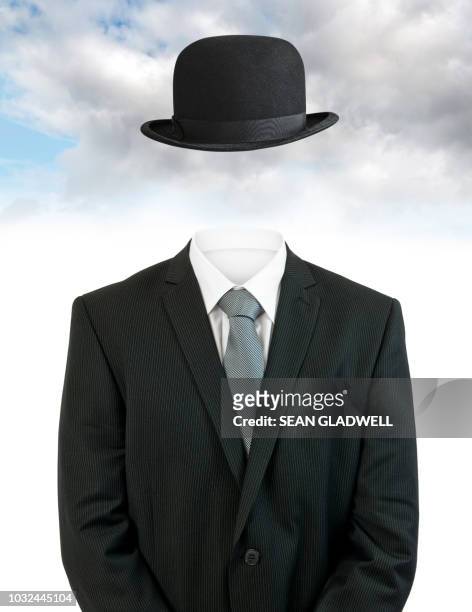 invisible businessman with black bowler hat - invisible man stock-fotos und bilder