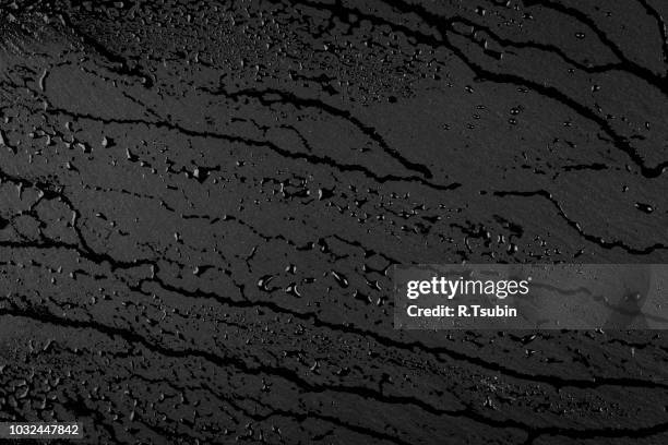 water on stone surface  in black and white - wet see through stock pictures, royalty-free photos & images