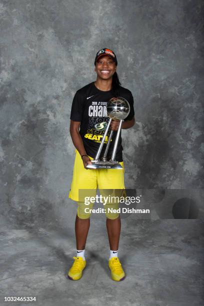 Jewell Loyd of the Seattle Storm poses with the 2018 WNBA Championship trophy after defeating the Washington Mystics in Game Three of the 2018 WNBA...