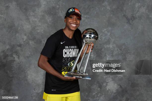Jewell Loyd of the Seattle Storm poses with the 2018 WNBA Championship trophy after defeating the Washington Mystics in Game Three of the 2018 WNBA...