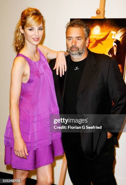 Actress Louise Bourgoin and director Luc Besson attend the photocall of 'The Extraordinary Adventures of Adele Blanc-Sec' at Hotel de Rome on August...