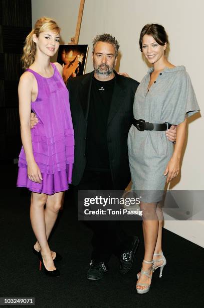 Actress Louise Bourgoin, director Luc Besson and German dubbing voice Jessica Schwarz attend the photocall 'The Extraordinary Adventures of Adele...