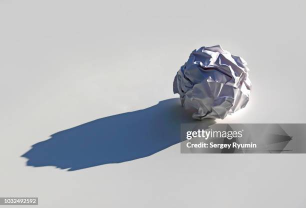 crumpled paper ball with a shadow - paper ball stock pictures, royalty-free photos & images