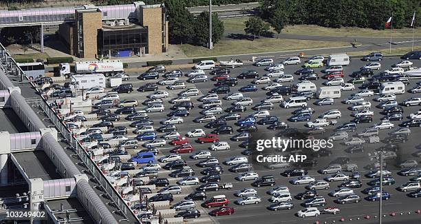 Aerial view of motorists are stranded on a highway on July 31, 2010 at the toll station near Villefranche-sur-Saône, eastern France, for the fifth...