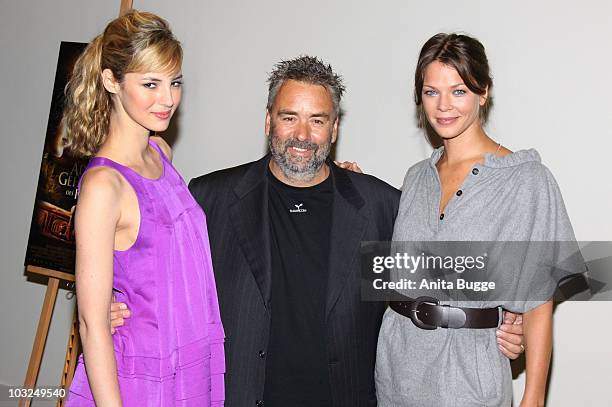 Actress Louise Bourgoin, director Luc Besson and German dubbing voice, actress Jessica Schwarz, attend the photocall of 'The Extraordinary Adventures...