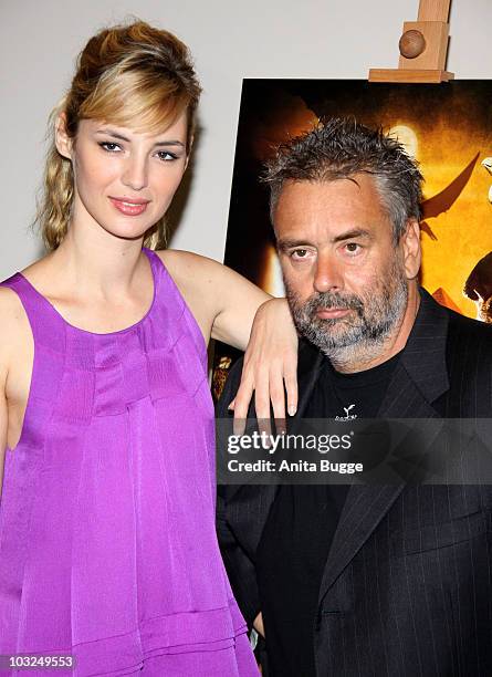 Actress Louise Bourgoin and director Luc Besson attend the photocall of 'The Extraordinary Adventures of Adele Blanc-Sec' at Hotel de Rome on August...