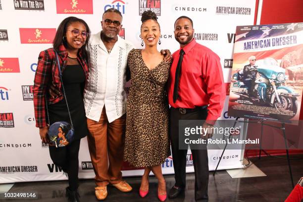 Actors Keith David, Dionne Lea Williams and family attend the premiere of Cinedigm's "American Dresser" at Laemmle's Monica Film Center on September...