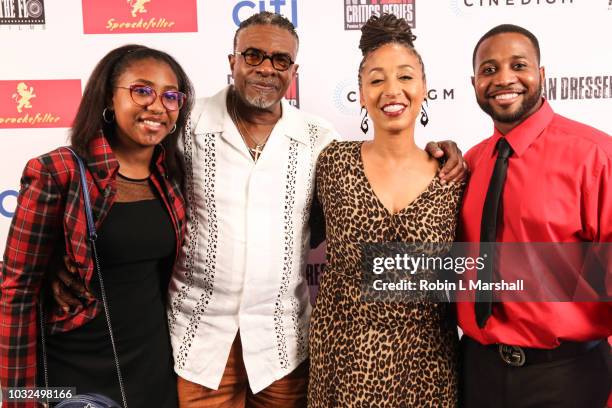 Actors Keith David, Dionne Lea Williams and family attend the premiere of Cinedigm's "American Dresser" at Laemmle's Monica Film Center on September...
