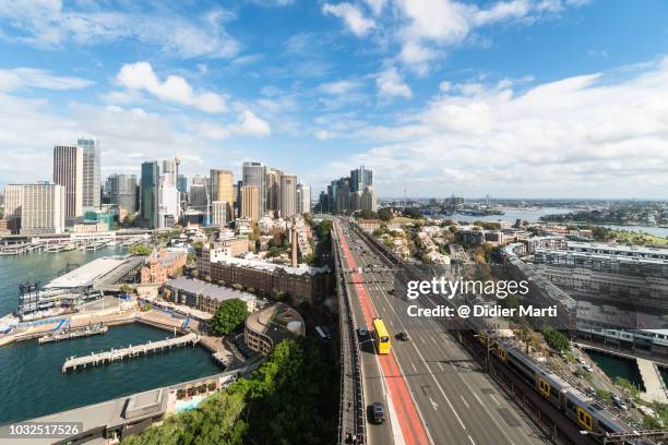 aerial view of highway and downtown district in sydney - traffic australia stock pictures, royalty-free photos & images