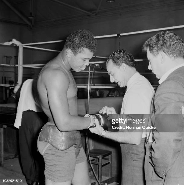 American boxer Muhammad Ali with his manager and trainer Angelo Dundee , UK, 11th June 1963.