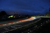 Racing car lights Nürburgring 24h race at the Nürburgring long exposure at the Schwalbenschwanz bend