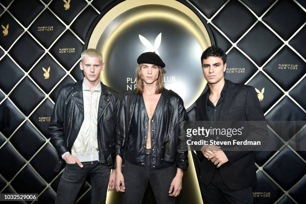 Shen Kai, Colin Lamont, and Ameil Anderson arrive at Playboy Club New York Grand Opening on September 12, 2018 in New York City.