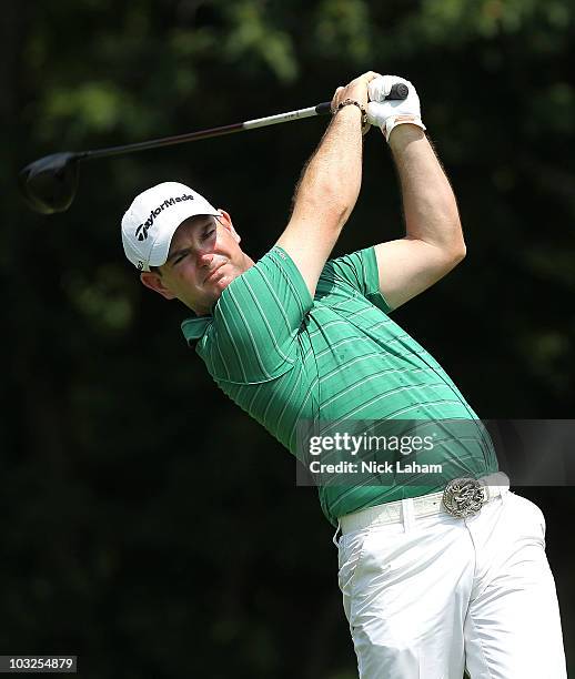 Rory Sabbatini of South Africa hits his tee shot on the 4th hole during round one at the Turning Stone Resort Championship at Atunyote Golf Club held...