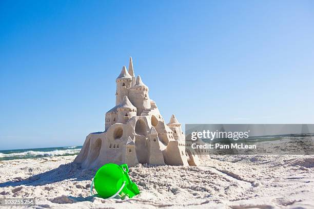 fairy tale sand castle on the beach - château de sable photos et images de collection