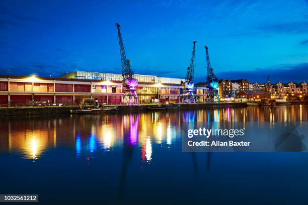 skyline of bristol'sfloating harbour illuminated at night - bristol england bildbanksfoton och bilder