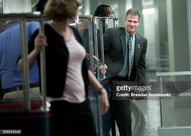 Sen. Scott Brown arrives on the Senate's subway to vote on Capitol Hill August 5, 2010 in Washington, DC. The Senate voted 63-37 to confirm Solicitor...