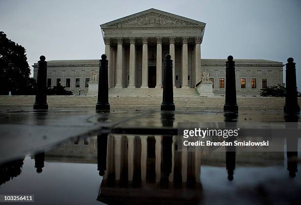 The US Supreme Court building is reflected in water August 5, 2010 in Washington, DC. The Senate voted 63-37 to confirm Solicitor General and former...
