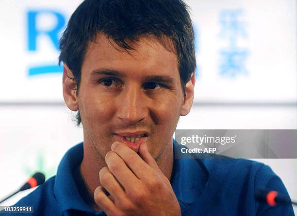 Barcelona's Argentinian player Lionel Messi attends a press conference in Beijing on August 5, 2010. The reigning Spanish football champions will...